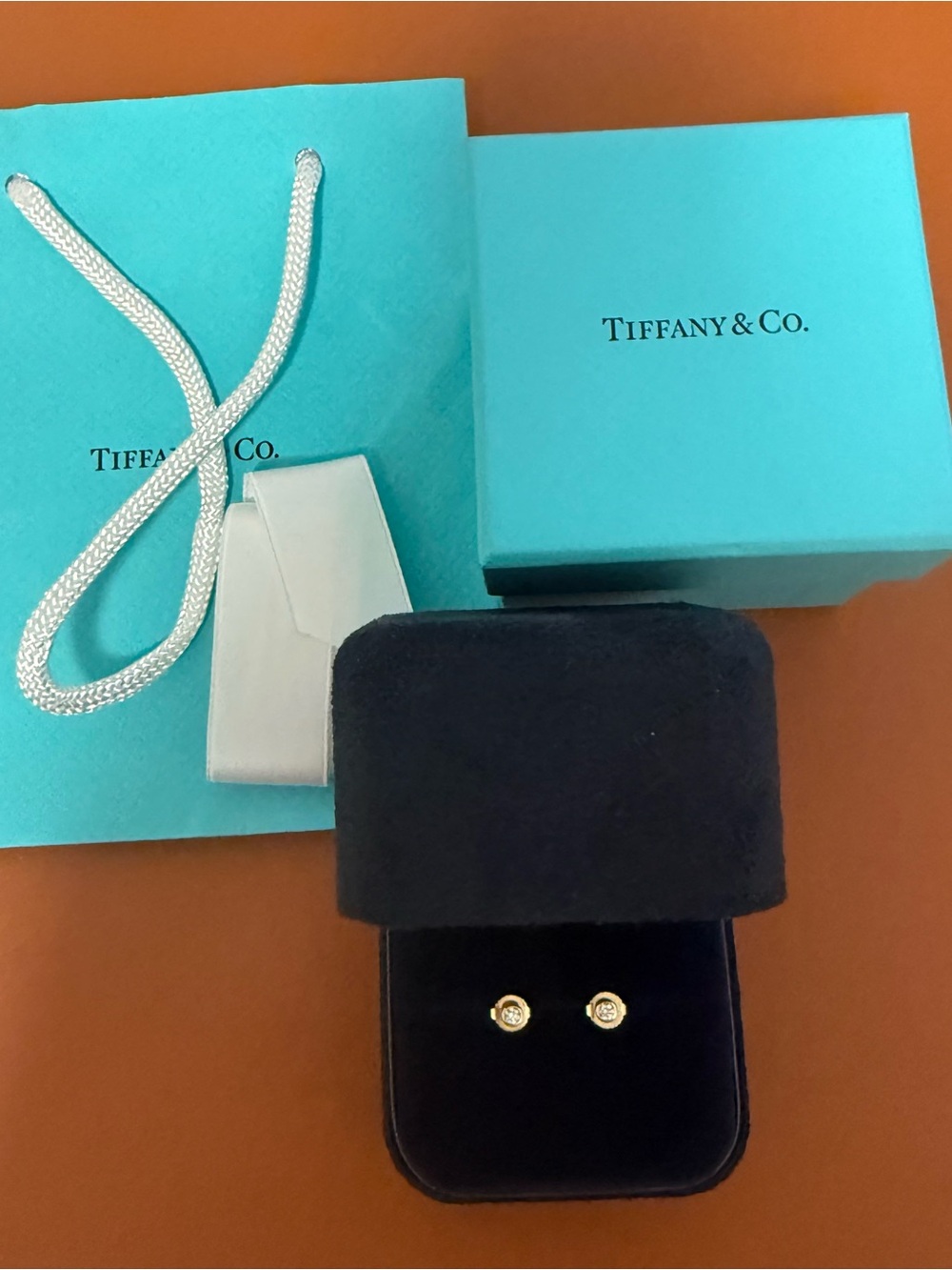 Tiffany & Co. elsa peretti 18k yellow gold 0.10 diamond stud earrings